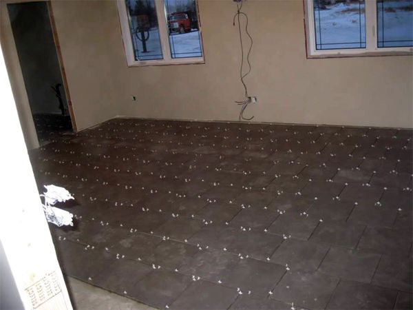 Porcelain tiles over heated slab